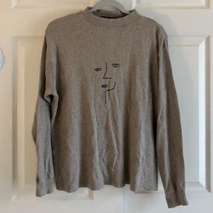 Reworked embroidered face sweater